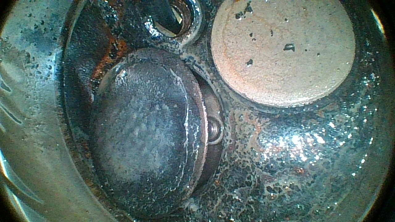 A close up of a metal object under a microscope.