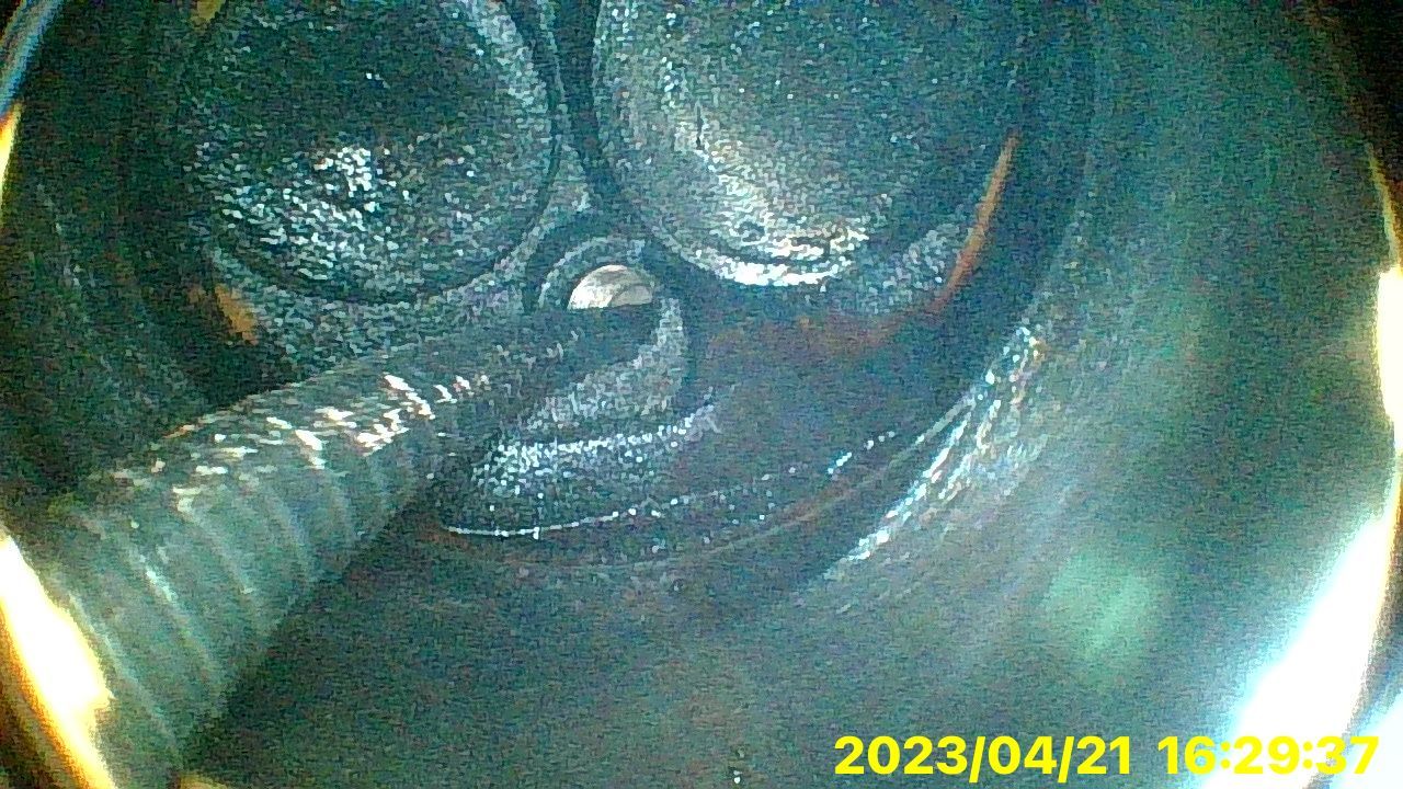 A close up of a black object with a date stamp on it.