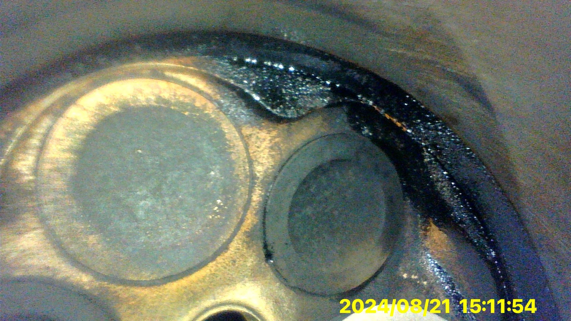 A close up of a metal object with a timestamp of 2021/8/21