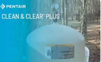 Pentair Clean & Clear Plus pool filter in a natural outdoor setting. Blue and white text overlay. Pentair Clean & Clear Plus pool filter in a natural outdoor setting. Blue and white text overlay.