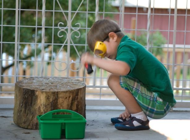 montessori child hammering