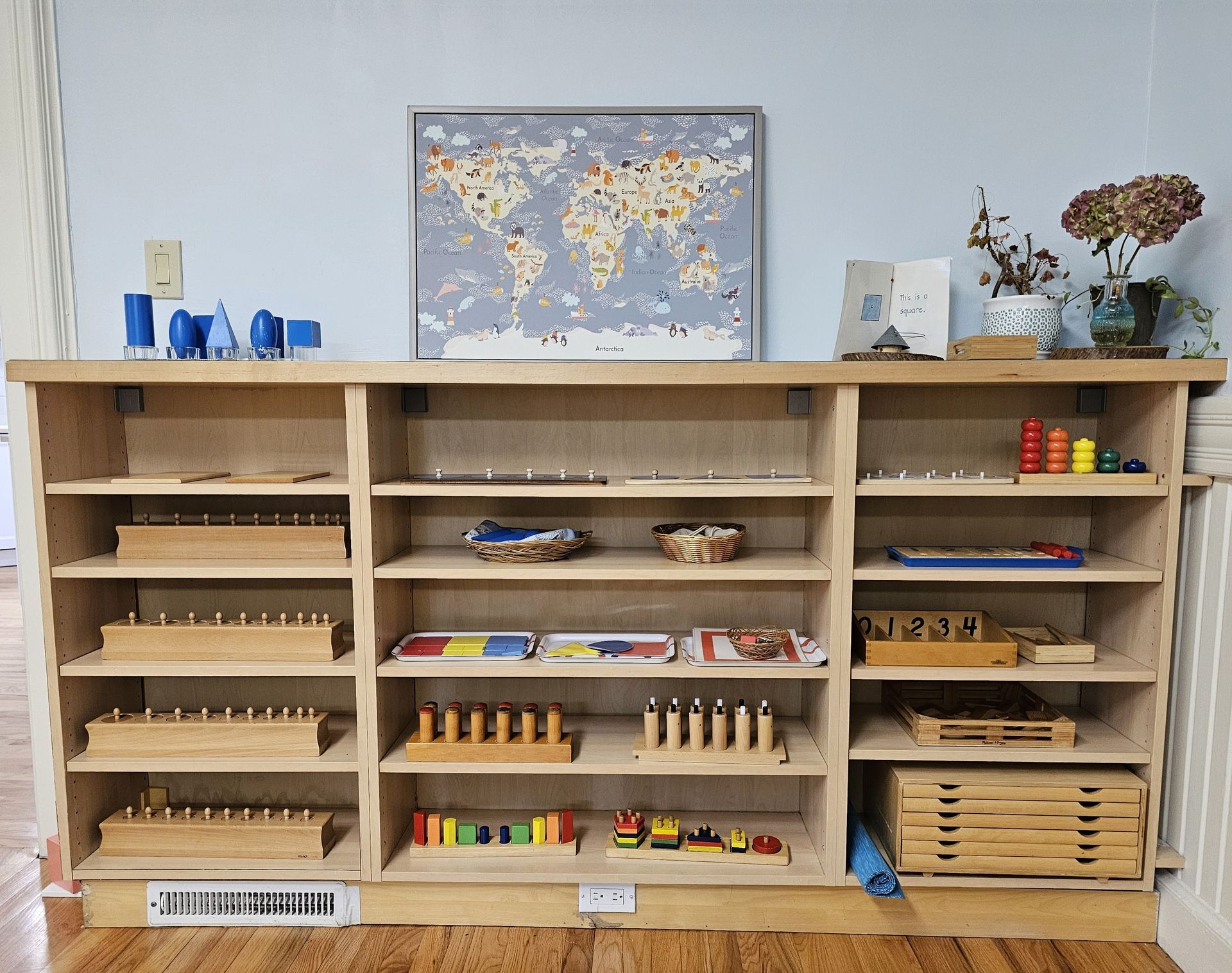 Montessori classroom shelving with montessori materials.