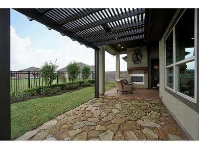 Attached aluminum pergola extending outdoor living space in Round Rock