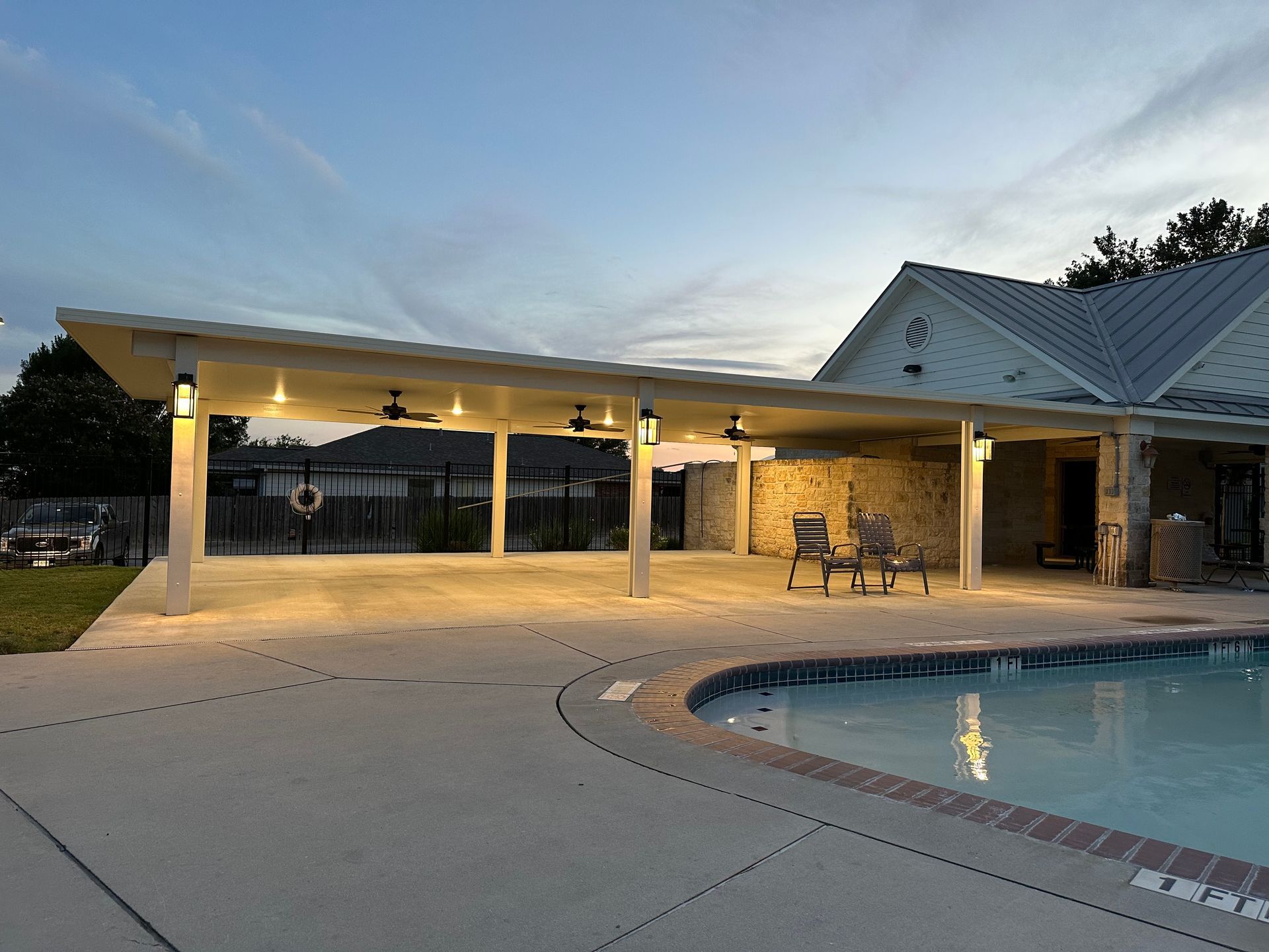 Sleek white aluminum patio cover in South Austin—low-maintenance upgrade for outdoor living