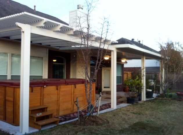 Elegant aluminum pergola in Hutto backyard with lattice roof shade
