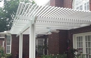 Attractive Alumawood pergola in Schertz with solid roof for maximum shade