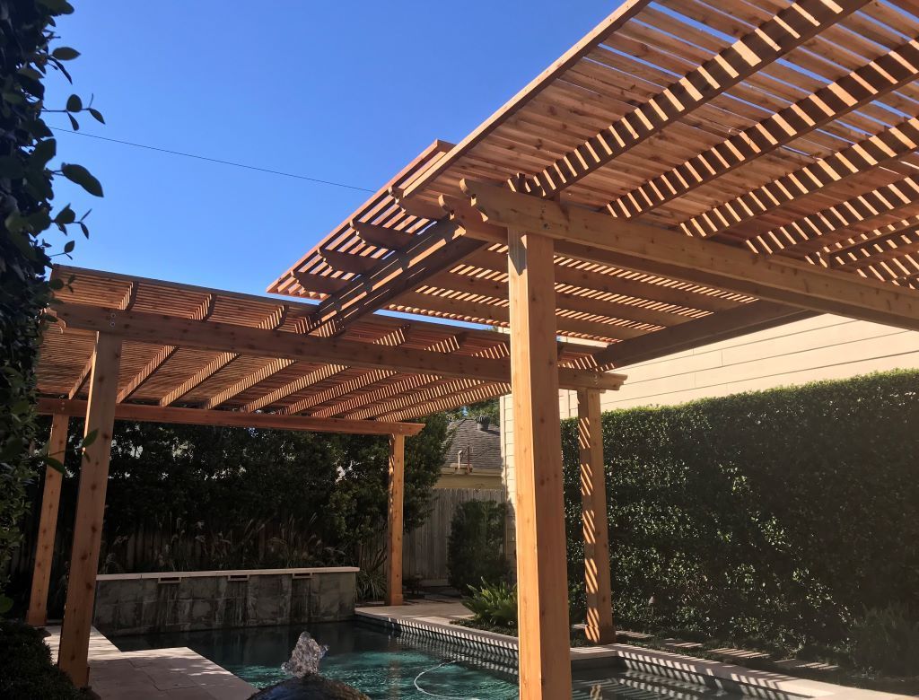 Elegant aluminum pergola in Boerne outdoor living space with solid roof design
