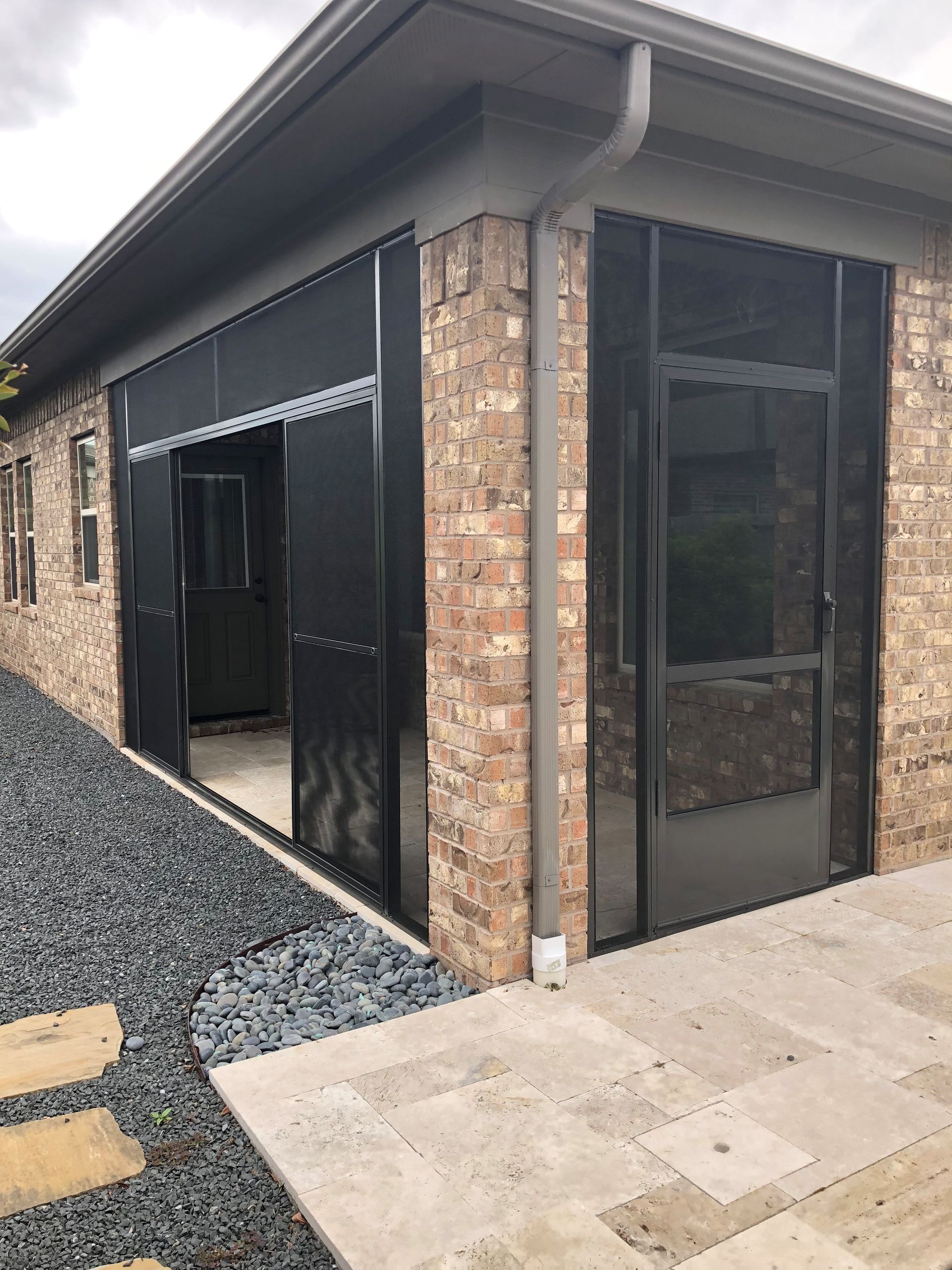 Screened porch corner section showing framing and mesh detail