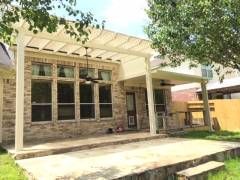 Aluminum pergola with insulated panels in Olmos Park historic home