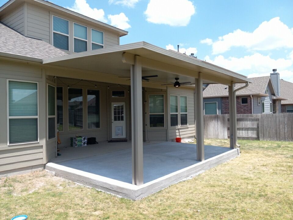 Traditional covered patio in Terrell Hills home