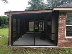 Completed screen room project with HOA‑approved design in Pflugerville, TX