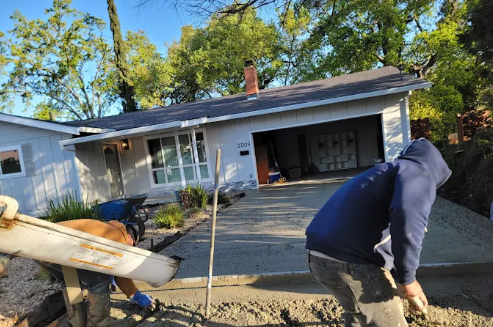 Landscape architect planning outdoor design at a Martinez, CA property by Vargas Landscape Plus