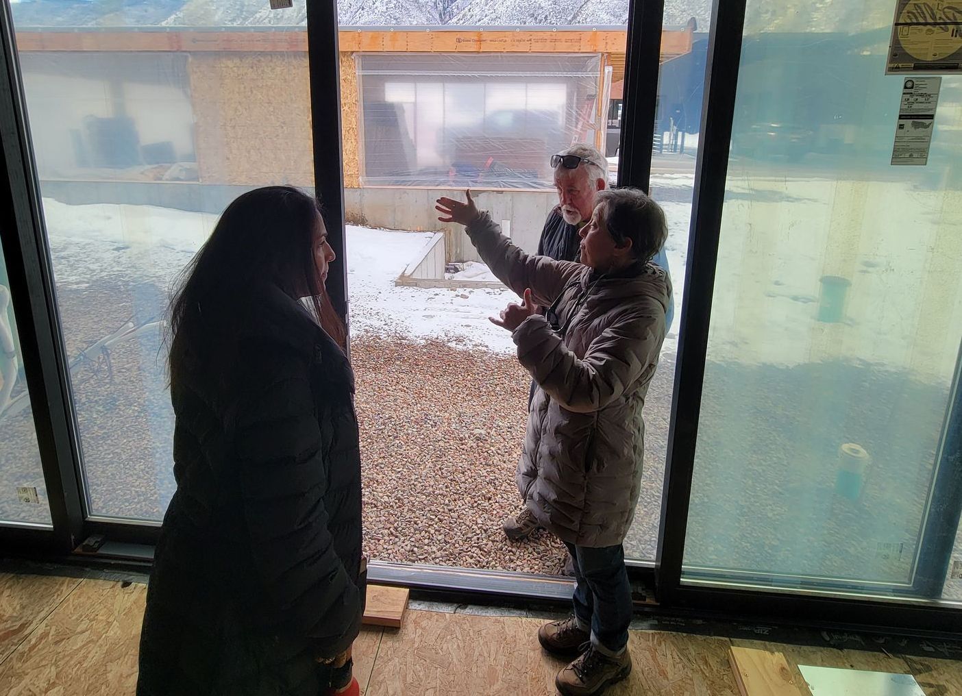 CORE staff member conducting a home energy assessment in Aspen, demonstrating their hands-on approach to climate solutions.