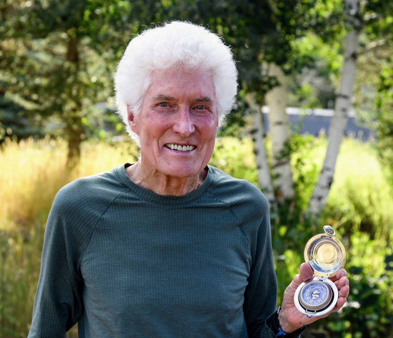 Bill Stirling holding a barometer