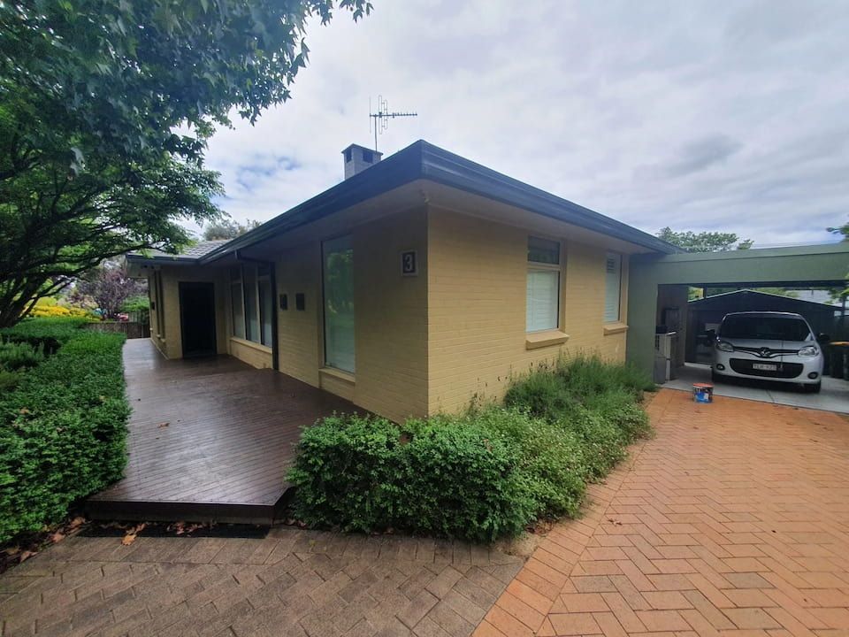 A House With A Car Parked In Front Of It — Peter the Painter In Tuggeranong, ACT