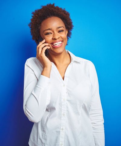 Woman Using Phone — Atlanta, GA — Metro Dental