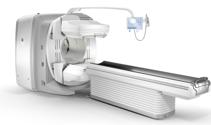 A ct scan machine with a monitor attached to it