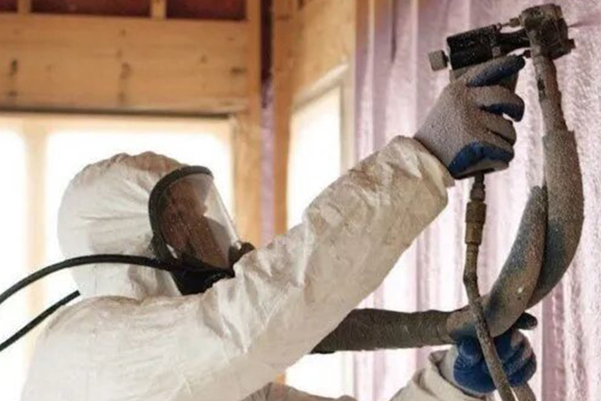 Spraying Insulation on a Wall — New Richmond, WI — Spray Foam Technologies LLC