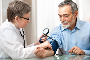 Doctor Checking the Blood Pressure — Hampstead, NC —  Hampstead Medical Center PC