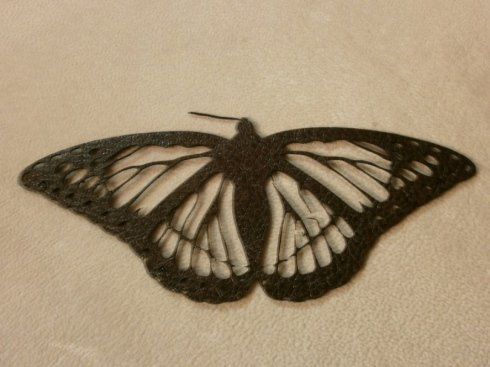 rappresentazione farfalla in metallo realizzata con laser cut
