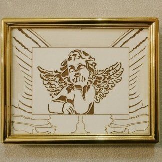 quadro con cornice dorata che raffigura un angioletto
