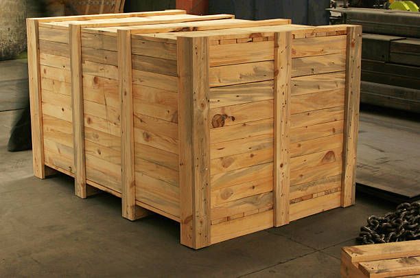 Warehouse interior with wooden crate, highlighting efficiency and reliable crates for shipping.
