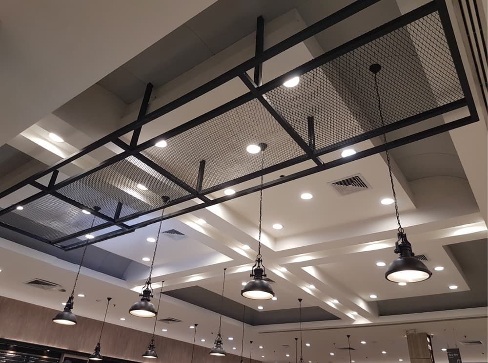 The Ceiling of A Restaurant with Lots of Lights Hanging from It — Hantis Electrical Solutions in North Nowra, NSW