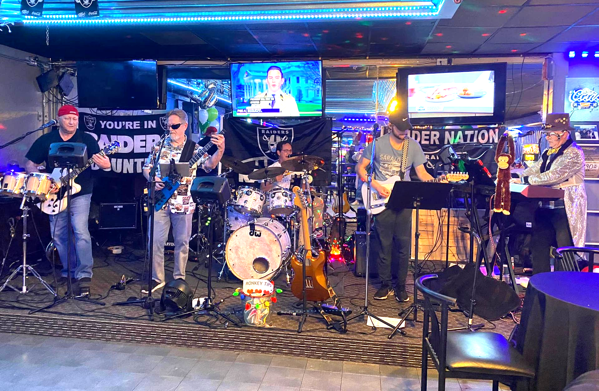 Live music, classic rock, musicians performing on a stage