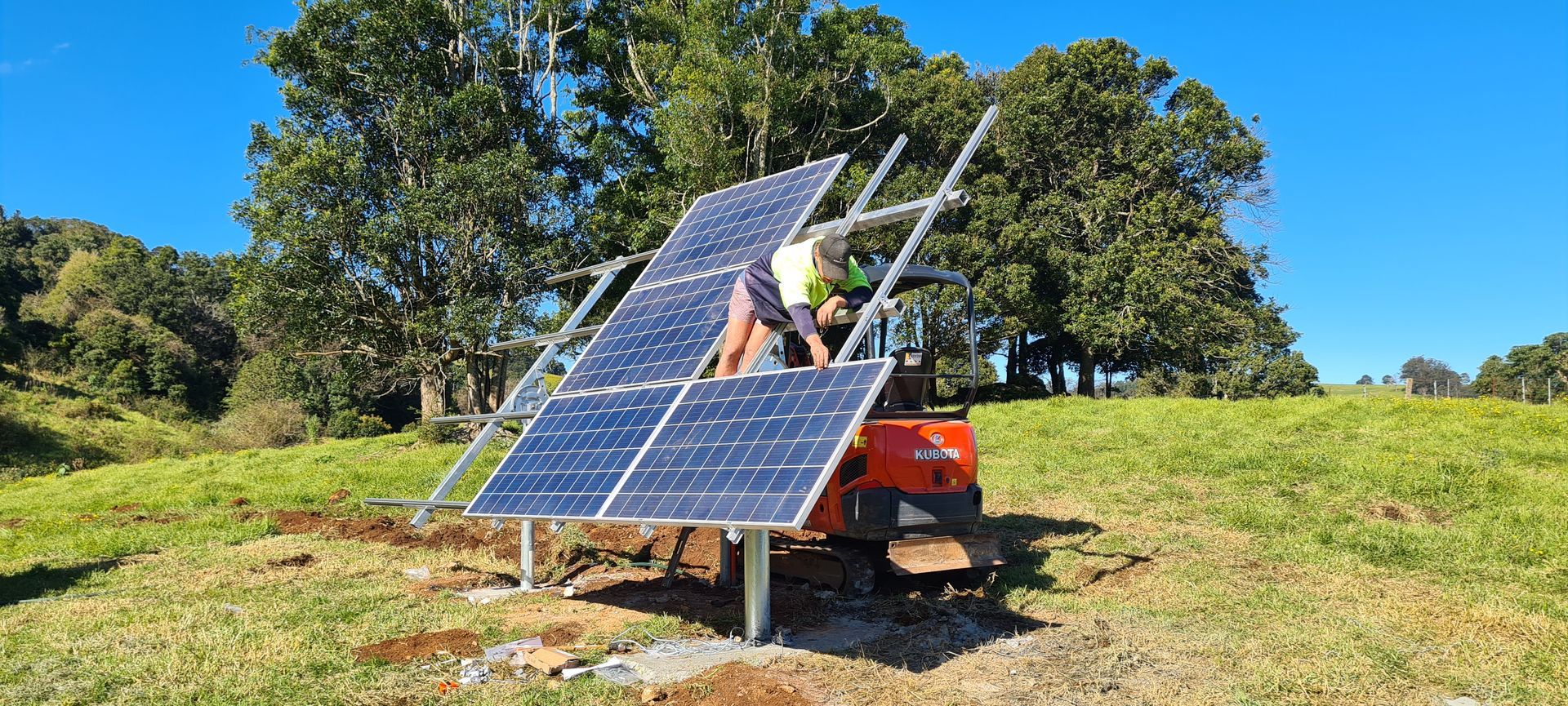 A Solar Panel Is Sitting In The Middle Of A Field — Midcoast Irrigation & Horticultural Supplies In Wauchope, NSW