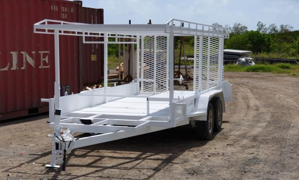A White Trailer is Parked in Front of a Red Line Shipping Container — All Blast and Paint in Sarina, QLD