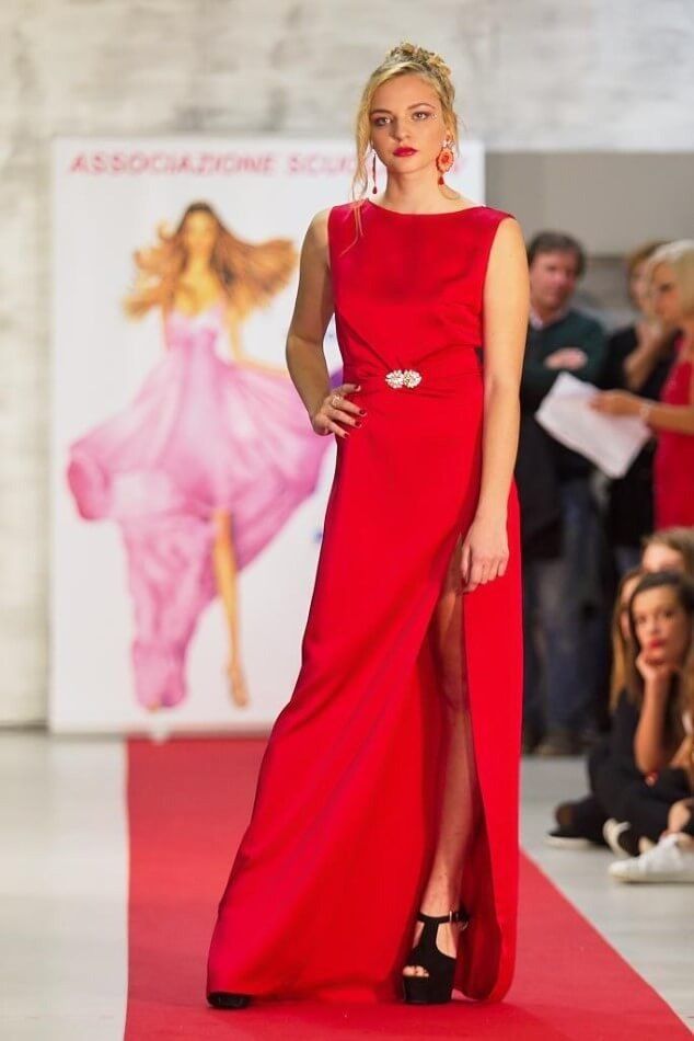 Model in elegant dress on the catwalk