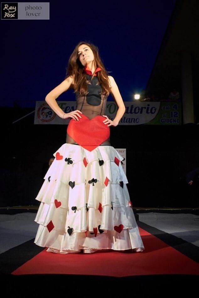 Model in elegant dress on the catwalk