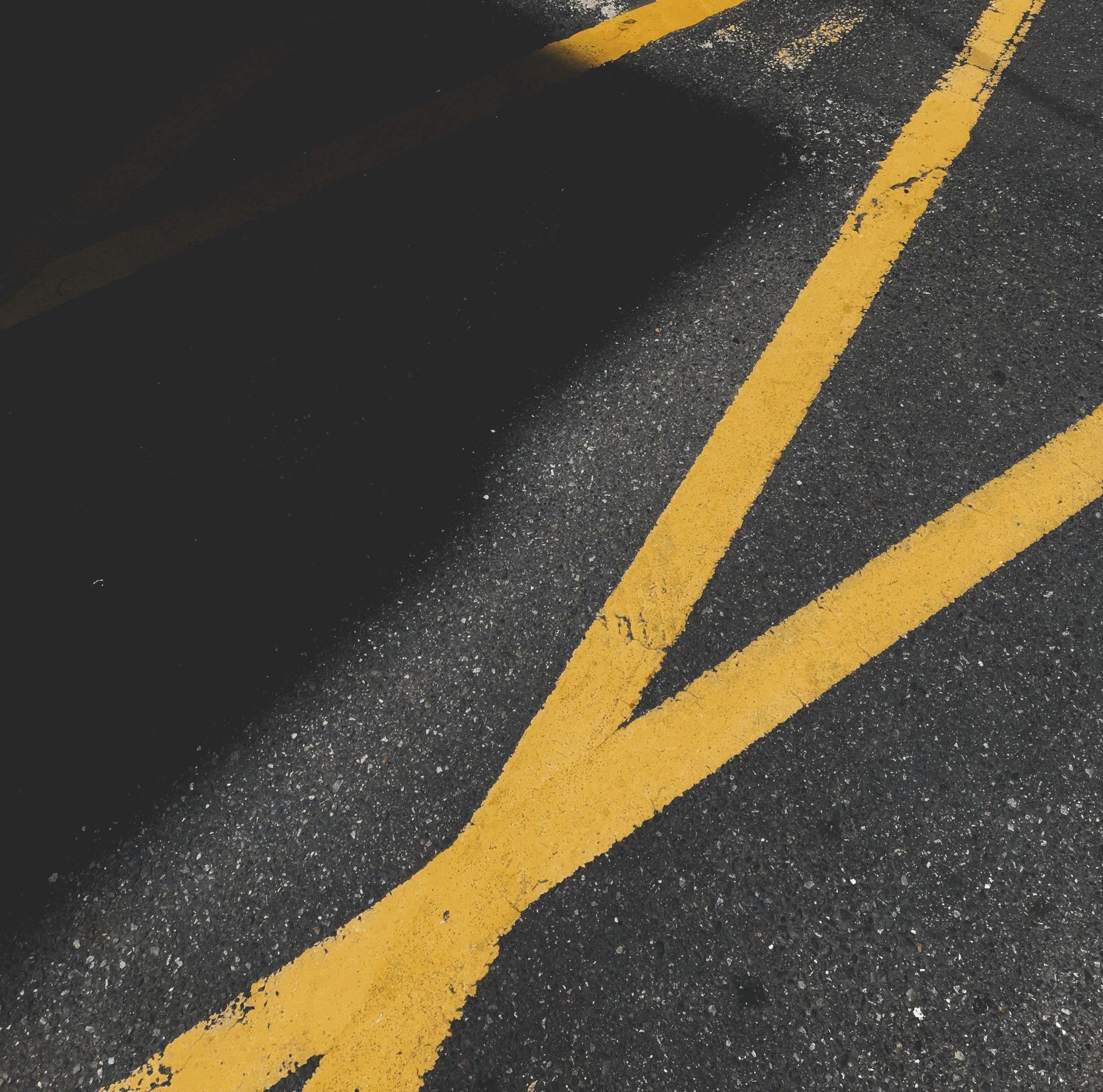 An open space with yellow line markings on the ground.