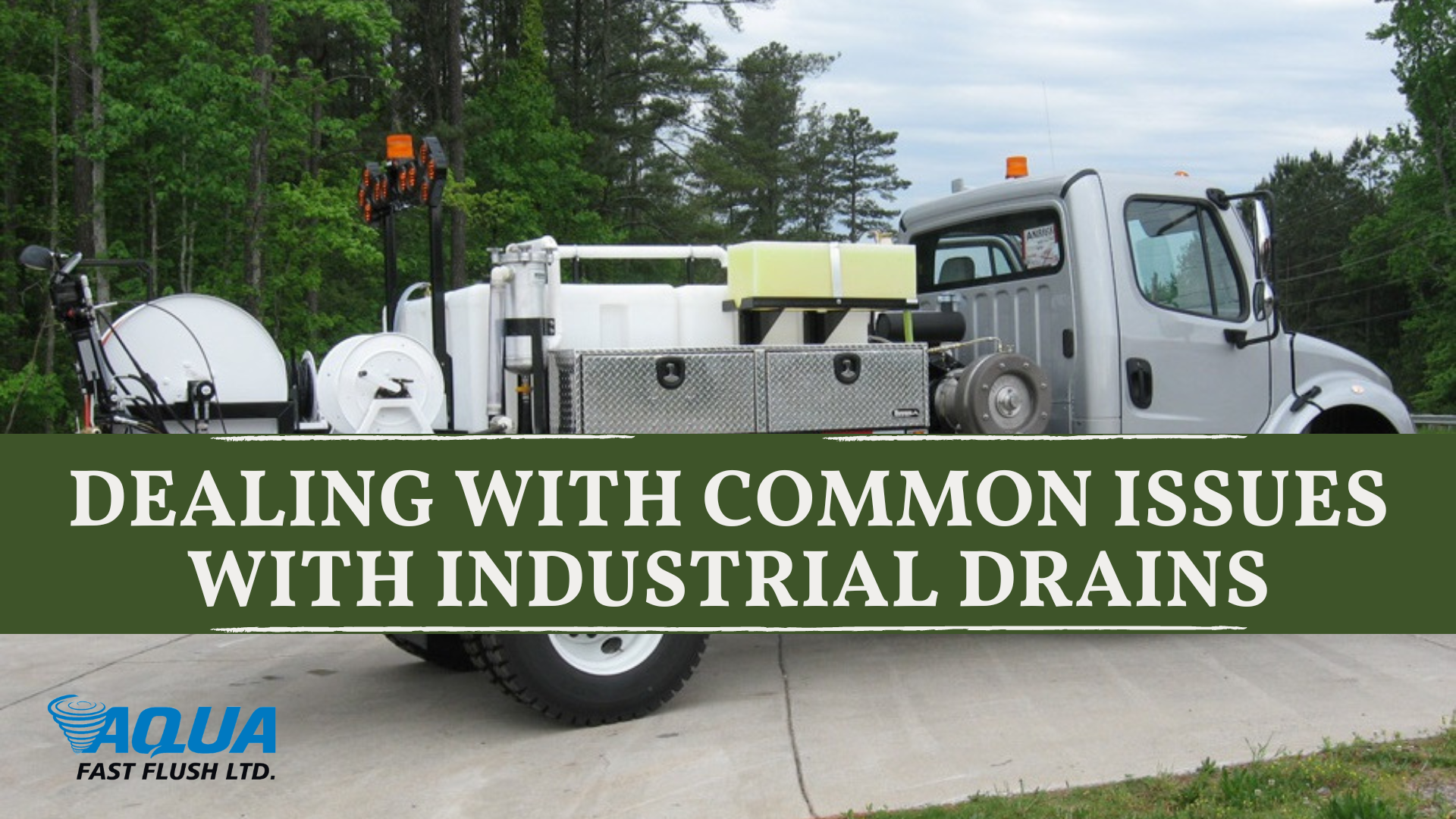 a truck with the words dealing with common issues with industrial drains on it