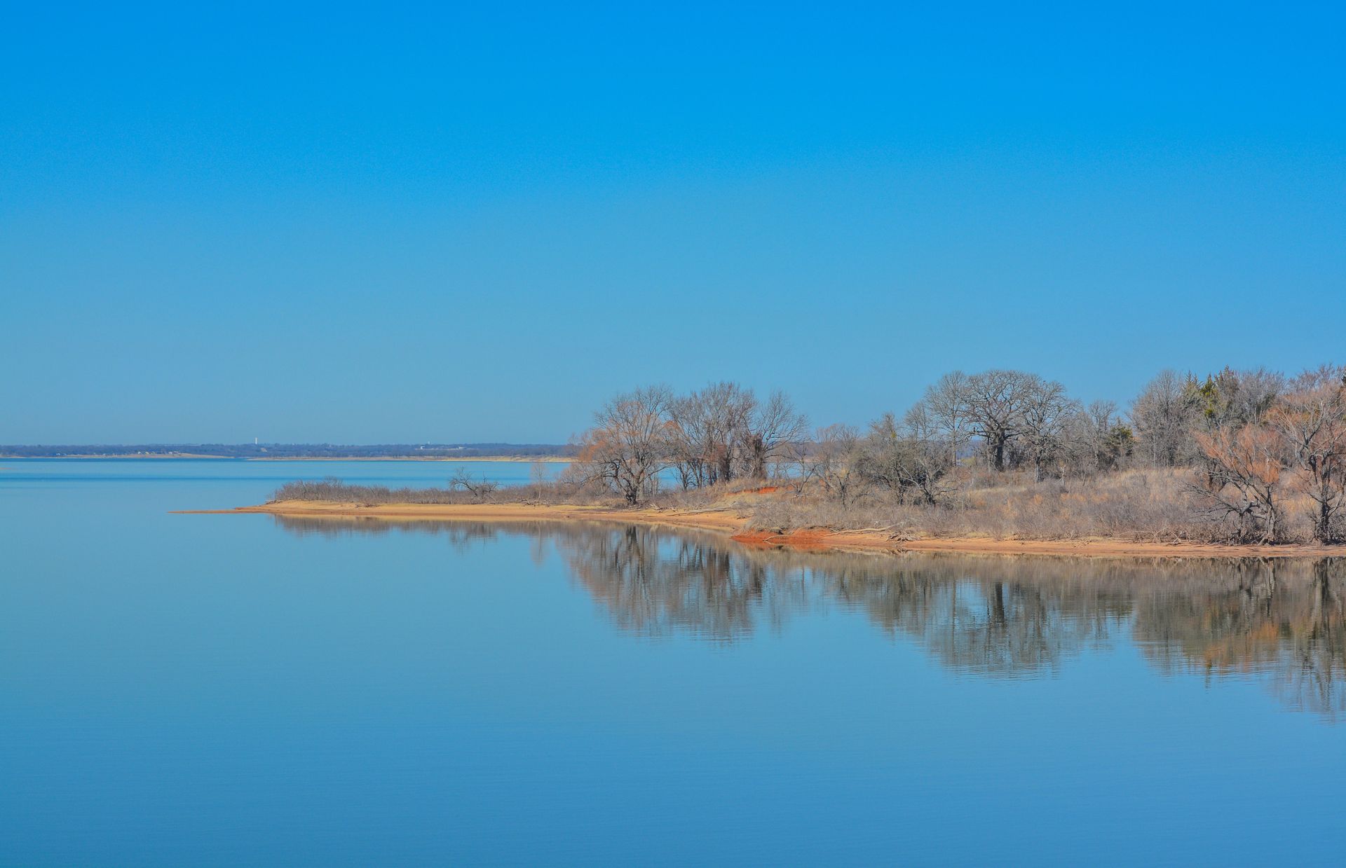 There is a small island in the middle of the lake.