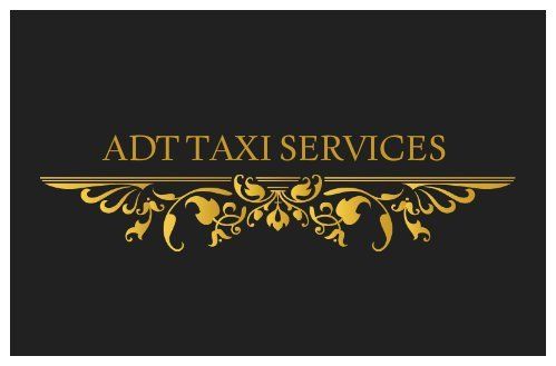 Een zwart-gouden logo voor adt taxidiensten