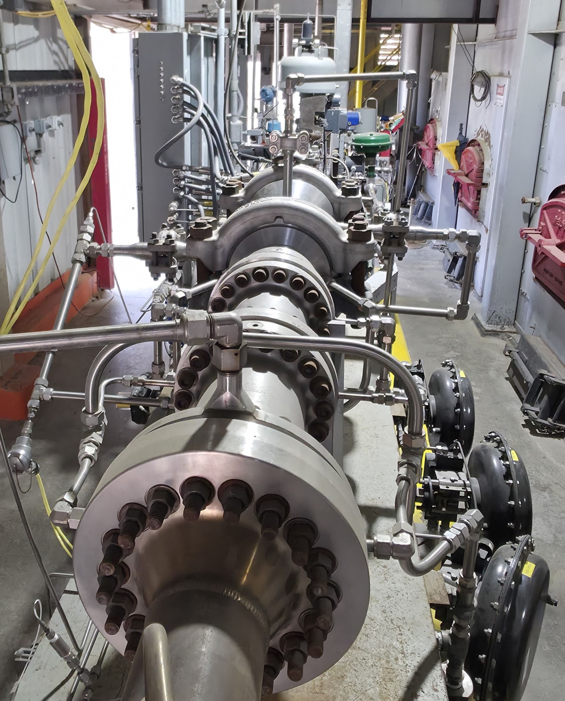 A large metal pipe with a lot of holes in it