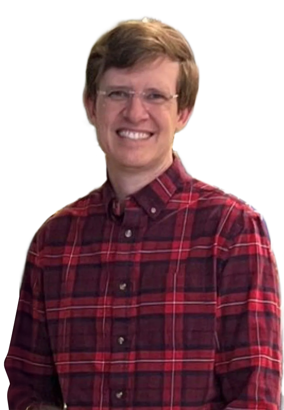 Smiling person in a red plaid shirt against a white background Smiling person in a red plaid shirt against a white background