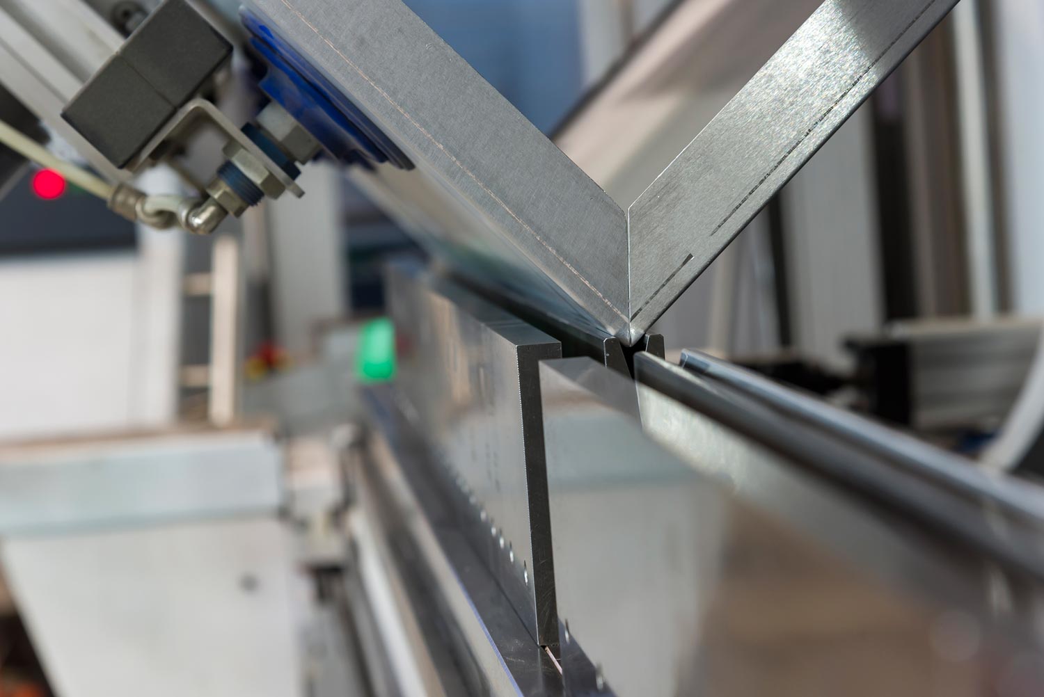 Operator Bending Metal Sheet — Merrillville, IN — Northwest Indiana Fabrication LLC