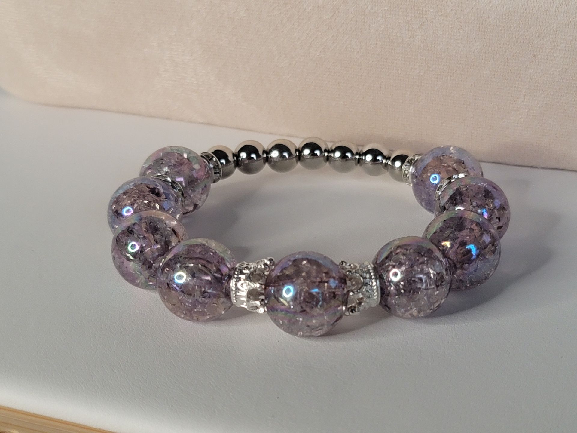 Elevate your jewelry collection with this stylish grey glass bead bracelet—a must-have for those who appreciate elegance with a touch of meaning. Shop now!