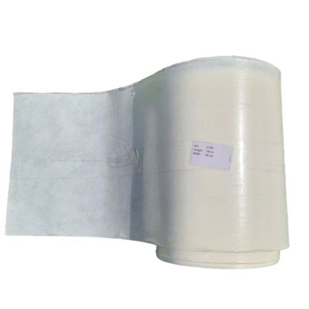 A roll of toilet paper is sitting on top of a white container.