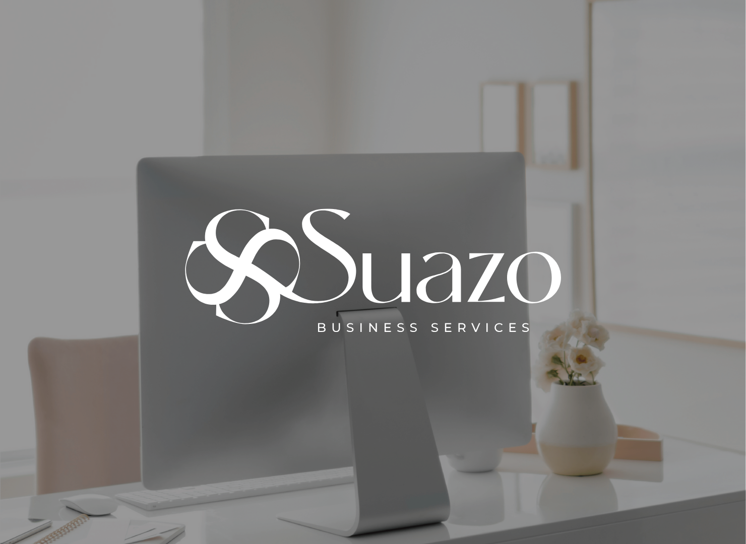 A computer monitor with the suazo business services logo on it