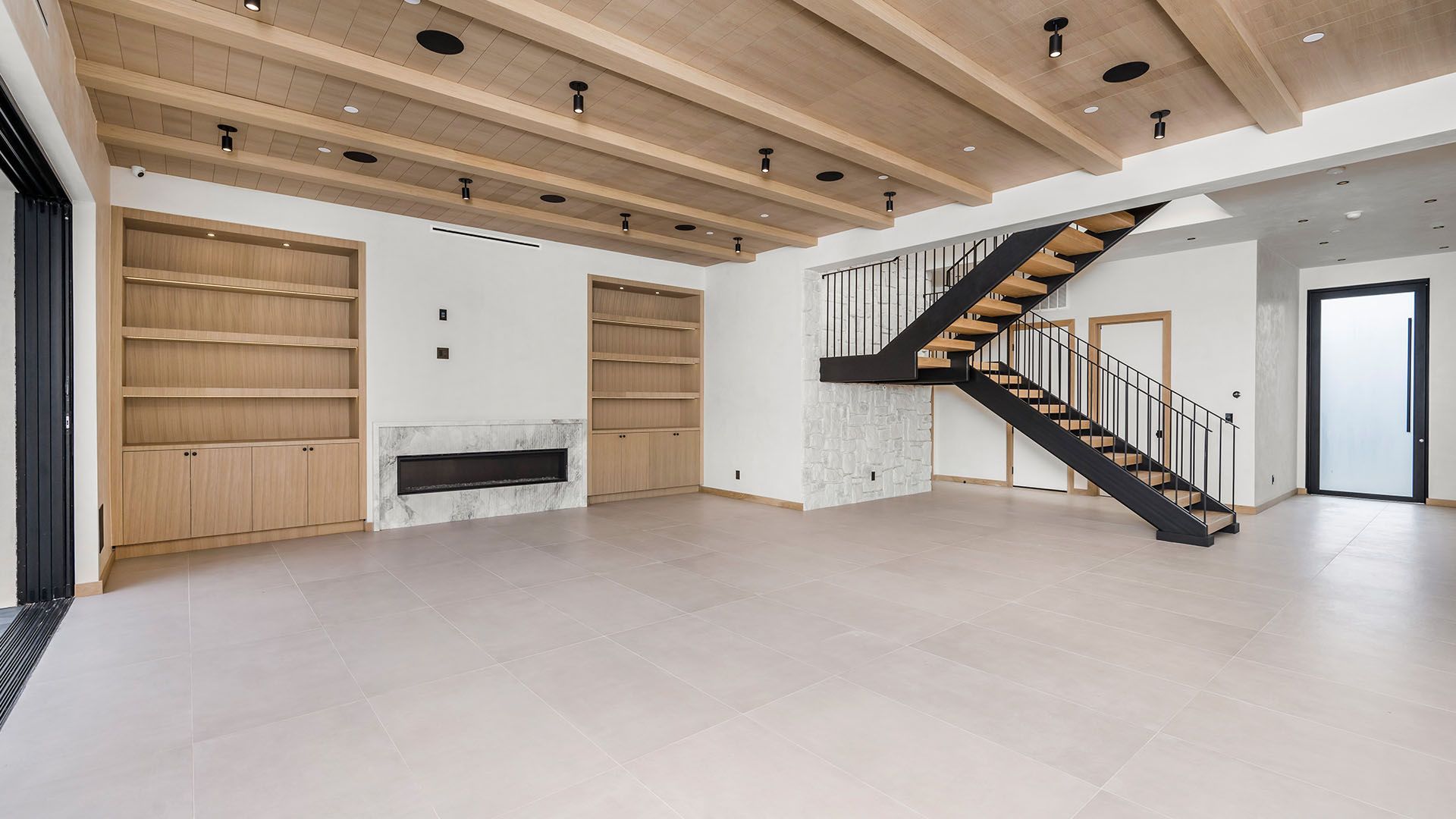 There is a staircase in the middle of the room.