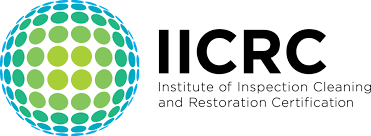 The IICRC logo: a sphere of teal and green dots next to the text 