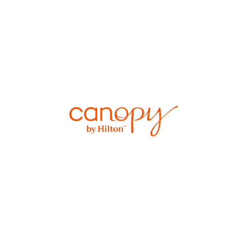 Canopy by Hilton logo in orange script on a white background.
