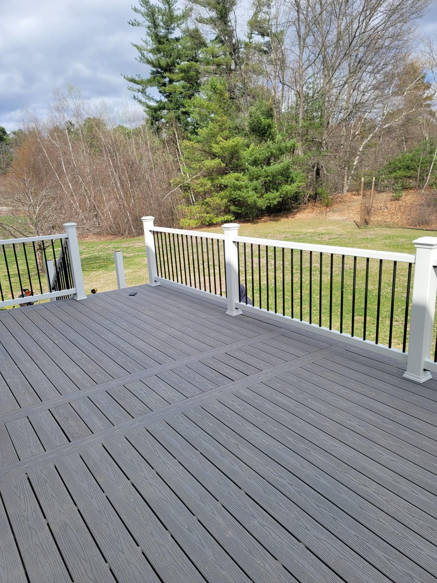 Gray Deck With a White Railing - Plaistow, NH - Dynamic Deck Solutions