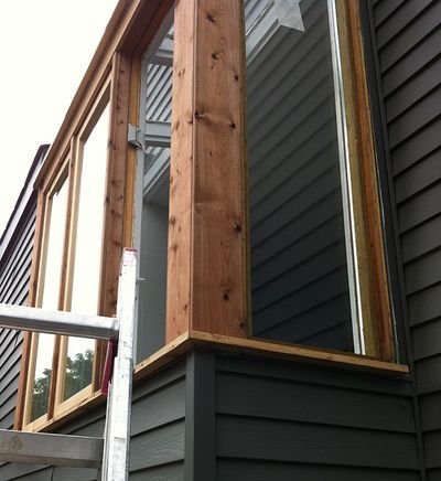 brown wooden railing on deck