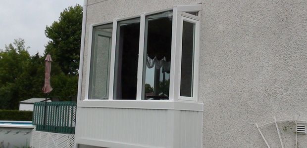 house with white siding and windows