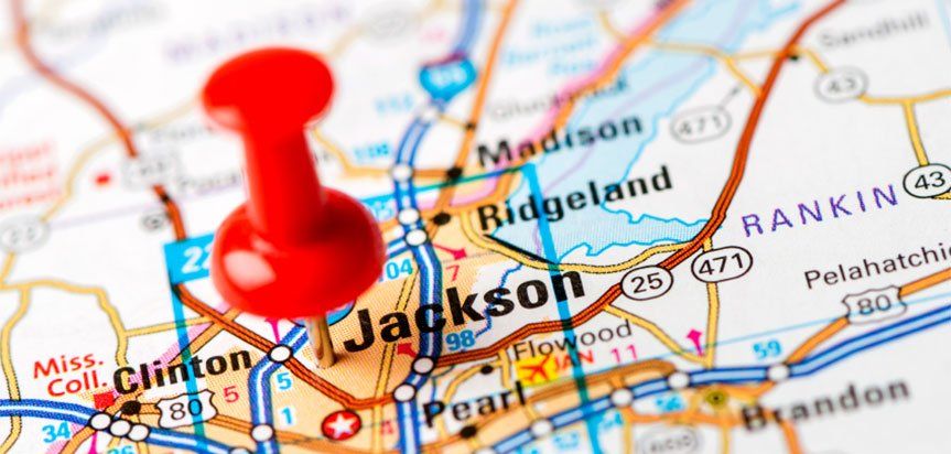 A map of Mississippi with a pin in Jackson