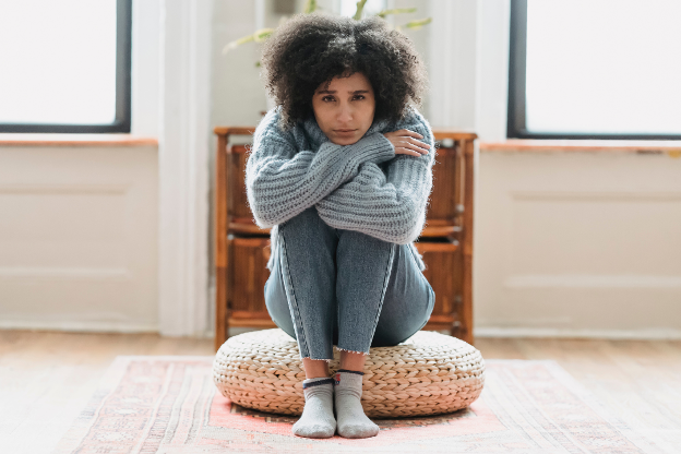Woman struggling with seasonal affective disorder